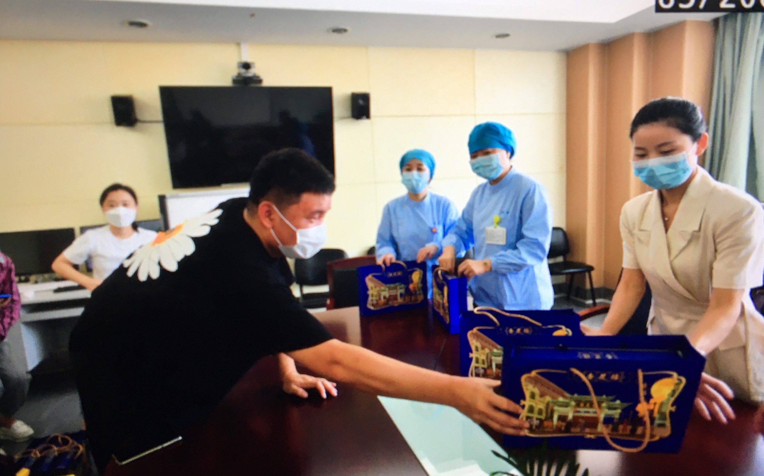 Jiang worked 12 hours a day as a cleaning staff working with doctors and nurses to treat COVID-19 patients.