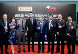 JD Auto's Yan Qing with other members of the auto team and Guiliano Menassi and the Pirelli team