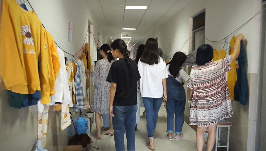 Students Shopping in Dorm Corridor