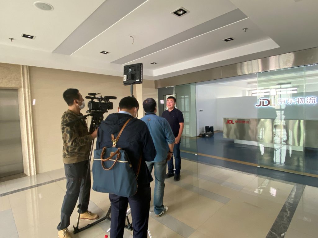 JD’s Qi Kong taking an interview at JD’s office in Changshu