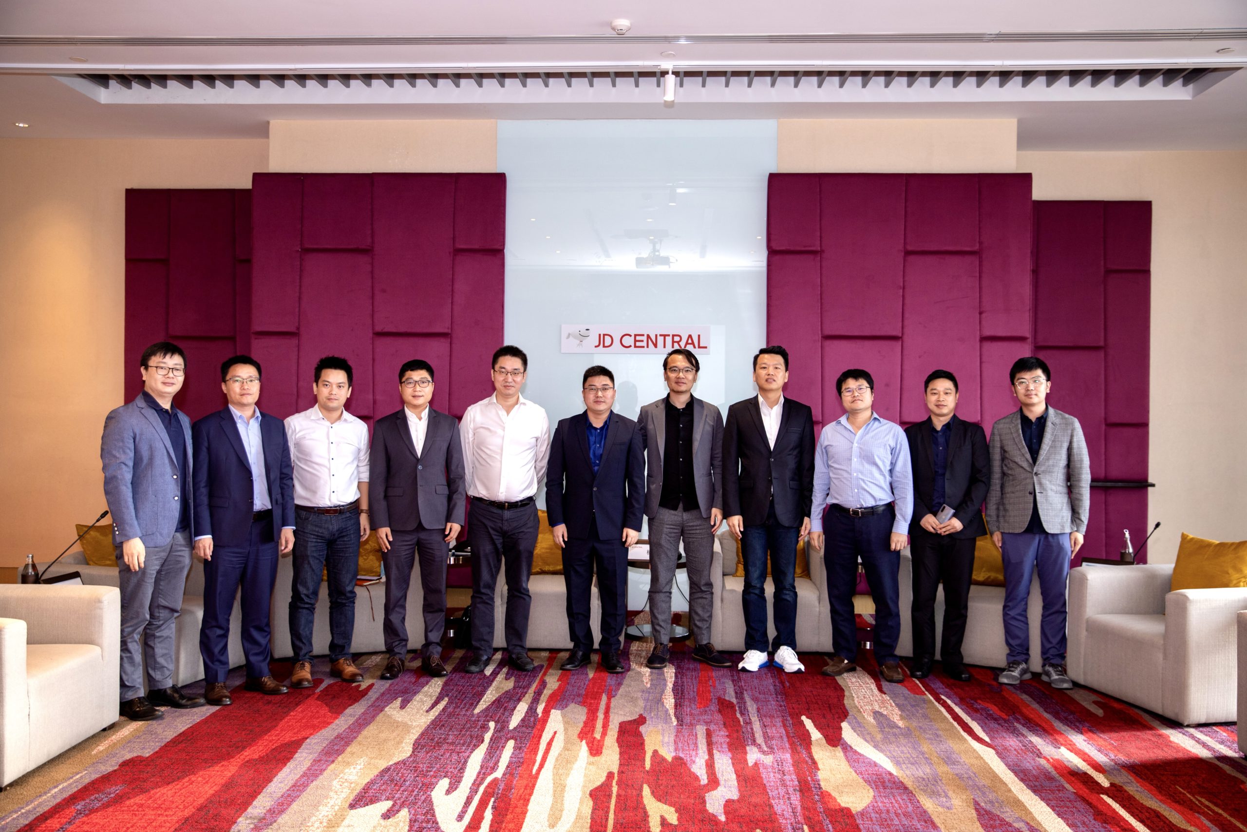 Vincent Yang (C), JDC CEO, joined by Chinese brands' country managers at gathering in September.