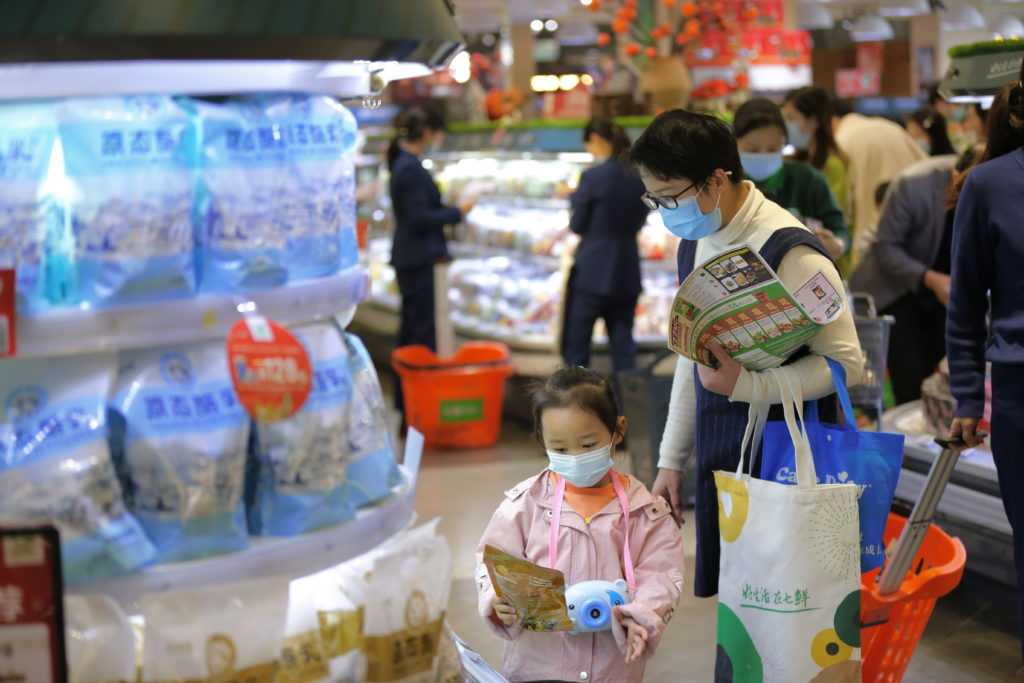 Customers visit SEVEN FRESH supermarket in Wuhan