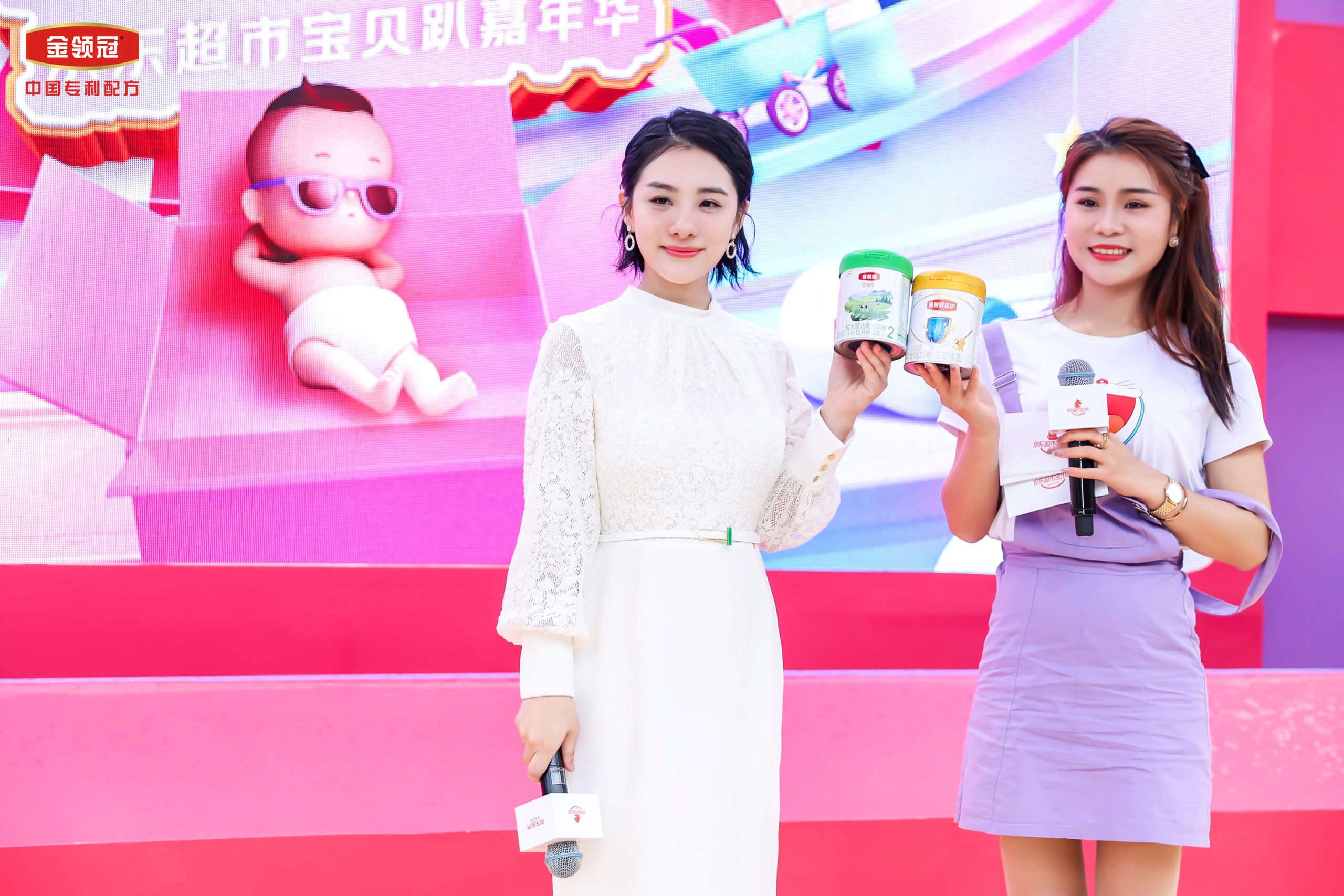 Olympic gymnastics champion Xuan Liu (left) showcasing infant milk powder