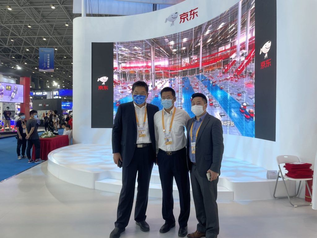 (From left to right) Victor Feng, head of GR, JD Retail, Xiaobo Jia, head of Hainan GR, JD.com, and Lawrence Liang, senior manager of strategy, JD Retail at JD’s Hainan Expo booth  